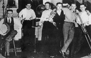 Bix Beiderbecke and his Rhythm Jugglers, 1925, from left to right: Howdy Quicksell (banjo), Tom Gargano (drums), Paul Mertz (piano), Don Murray (clarinet), Bix Beiderbecke (cornet), and Tommy Dorsey (trombone).
